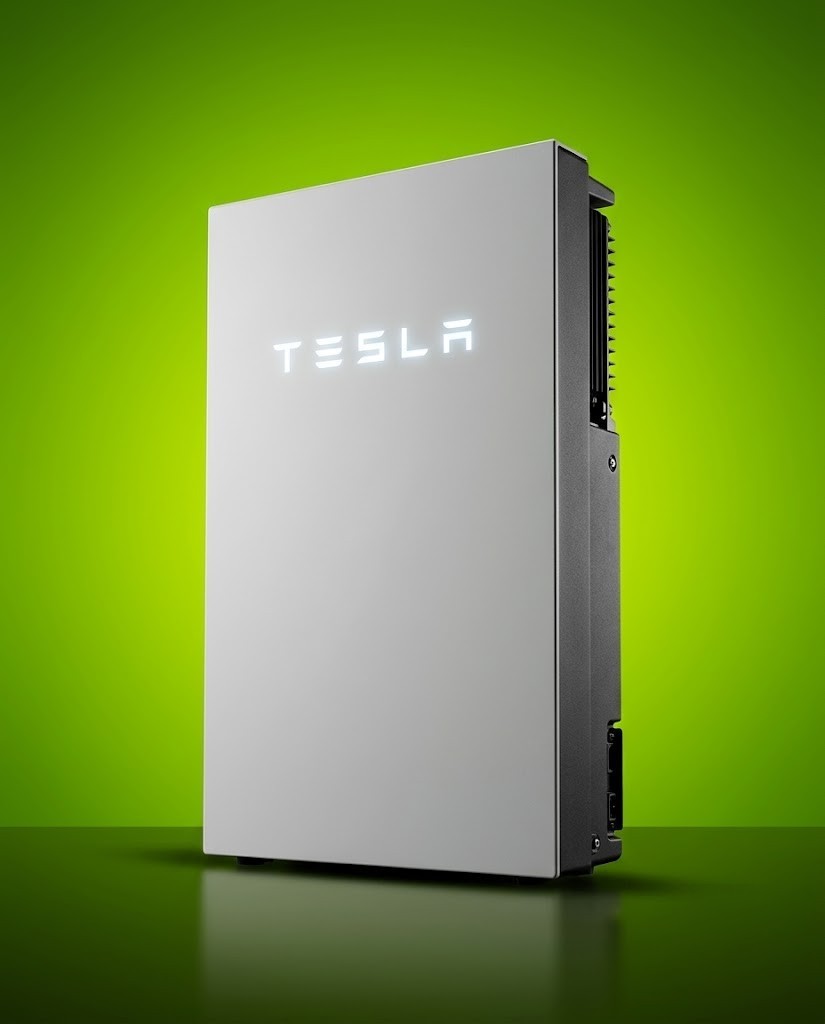 Tesla Powerwall 3 home battery Tesla Powerwall 3 home battery, the current 13.5 kWh solar-plus-battery model, on a green background